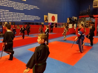 Children taking part in a karate lesson